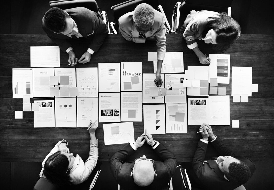 Business people analyzing statistics